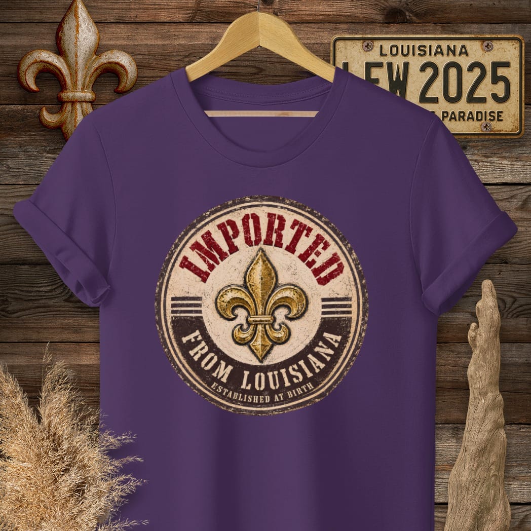 S / Purple Louisiana Imported T-Shirt by Laissez Faire Wear