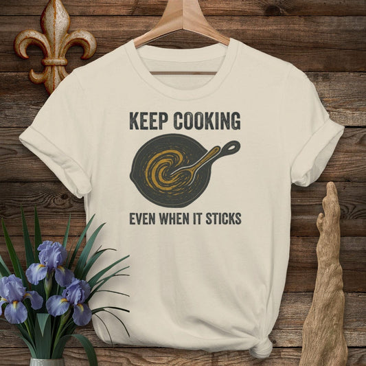 S / Sand Louisiana Keep Cooking Even When It Sticks T-Shirt by Laissez Faire Wear